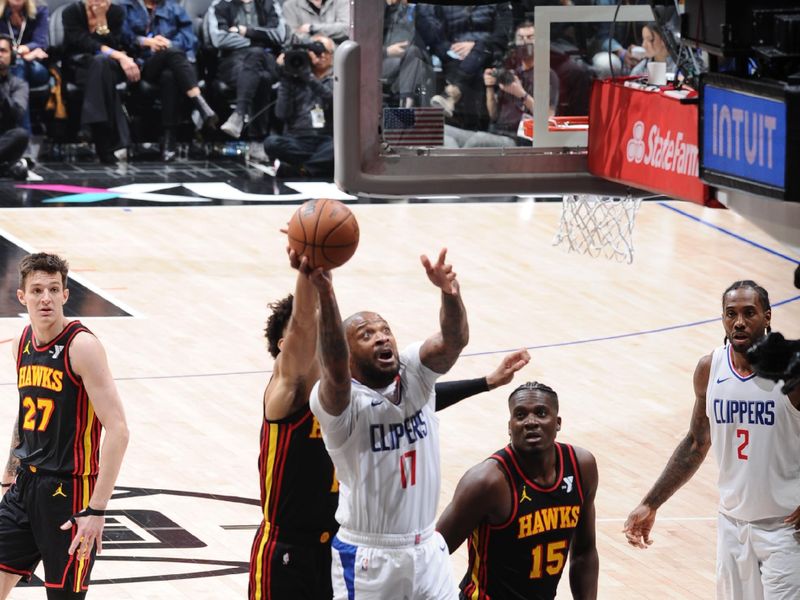 LOS ANGELES, CA - MARCH 17: PJ Tucker #17 of the LA Clippers drives to the basket during the game against the Atlanta Hawks on March 17, 2024 at Crypto.Com Arena in Los Angeles, California. NOTE TO USER: User expressly acknowledges and agrees that, by downloading and/or using this Photograph, user is consenting to the terms and conditions of the Getty Images License Agreement. Mandatory Copyright Notice: Copyright 2024 NBAE (Photo by Adam Pantozzi/NBAE via Getty Images)