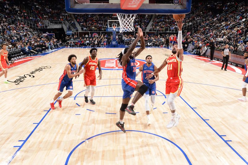 DETROIT, MI - NOVEMBER 8: Trae Young #11 of the Atlanta Hawks shoots the ball during the game against the Detroit Pistons on November  8, 2024 at Little Caesars Arena in Detroit, Michigan. NOTE TO USER: User expressly acknowledges and agrees that, by downloading and/or using this photograph, User is consenting to the terms and conditions of the Getty Images License Agreement. Mandatory Copyright Notice: Copyright 2024 NBAE (Photo by Chris Schwegler/NBAE via Getty Images)