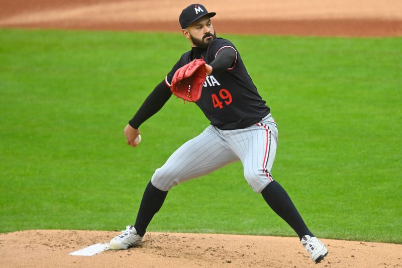Apr 30, 2025; Cleveland, Ohio, USA; Minnesota Twins starting pitcher Pablo Lopez (49) delivers a pitch in the first inning against the Cleveland Guardians at Progressive Field. Mandatory Credit: David Richard-Imagn Images