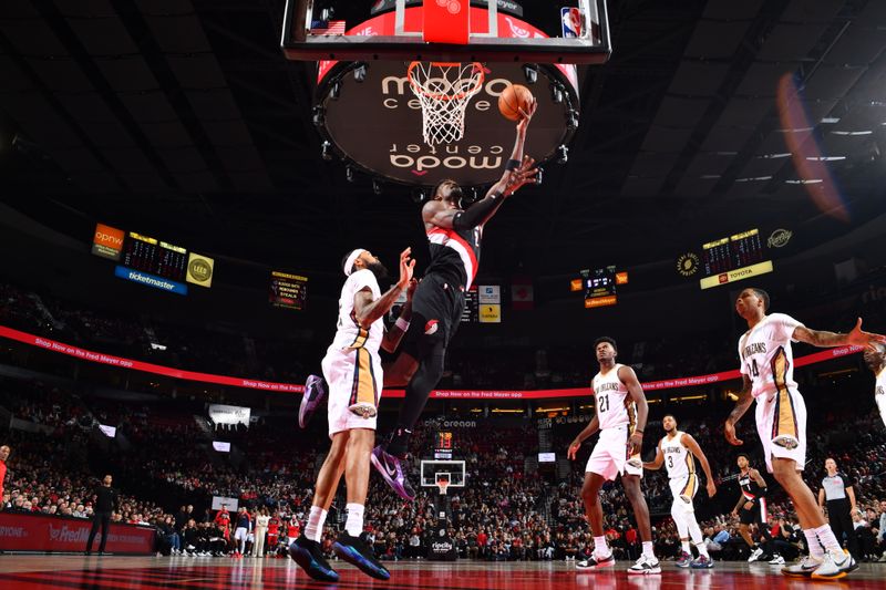 PORTLAND, OR - OCTOBER 25: Deandre Ayton #2 of the Portland Trail Blazers drives to the basket during the game against the New Orleans Pelicans on October 25, 2024 at the Moda Center Arena in Portland, Oregon. NOTE TO USER: User expressly acknowledges and agrees that, by downloading and or using this photograph, user is consenting to the terms and conditions of the Getty Images License Agreement. Mandatory Copyright Notice: Copyright 2024 NBAE (Photo by Barry Gossage/NBAE via Getty Images)