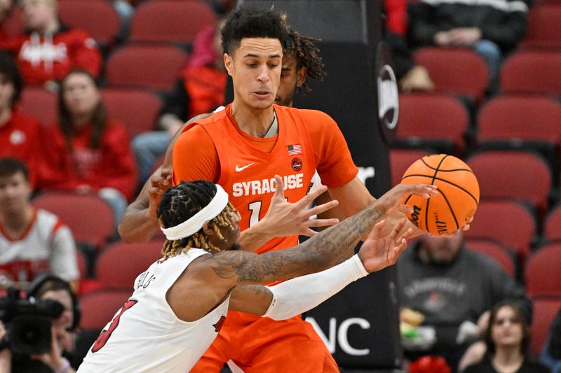 Jan 3, 2023; Louisville, Kentucky, USA; Louisville Cardinals guard El Ellis (3) attempts to steal the ball from Syracuse Orange center Jesse Edwards (14) during the second half at KFC Yum! Center. Syracuse defeated Louisville 70-69. Mandatory Credit: Jamie Rhodes-USA TODAY Sports