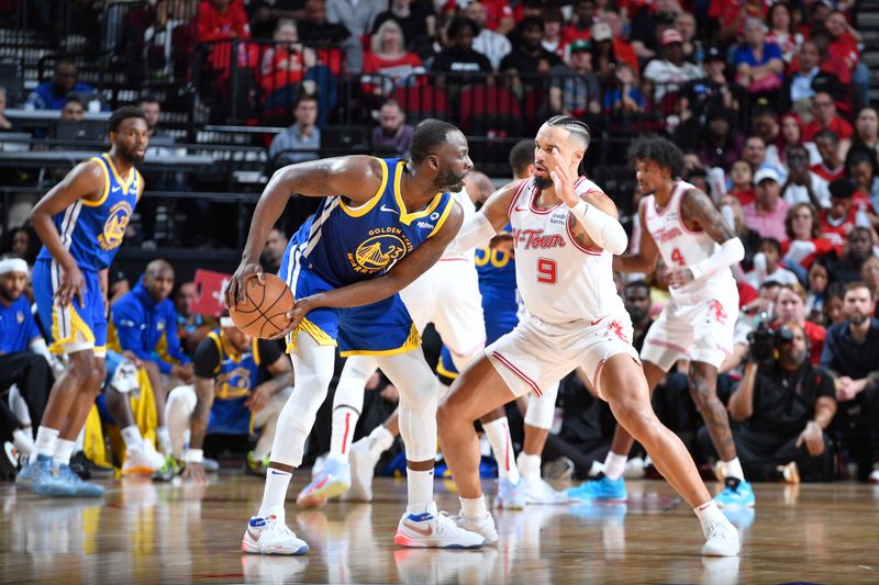 HOUSTON, TX - APRIL 4:  Draymond Green #23 of the Golden State Warriors handles the ball during the game against the Houston Rockets on April 4, 2024 at the Toyota Center in Houston, Texas. NOTE TO USER: User expressly acknowledges and agrees that, by downloading and or using this photograph, User is consenting to the terms and conditions of the Getty Images License Agreement. Mandatory Copyright Notice: Copyright 2024 NBAE (Photo by Logan Riely/NBAE via Getty Images)