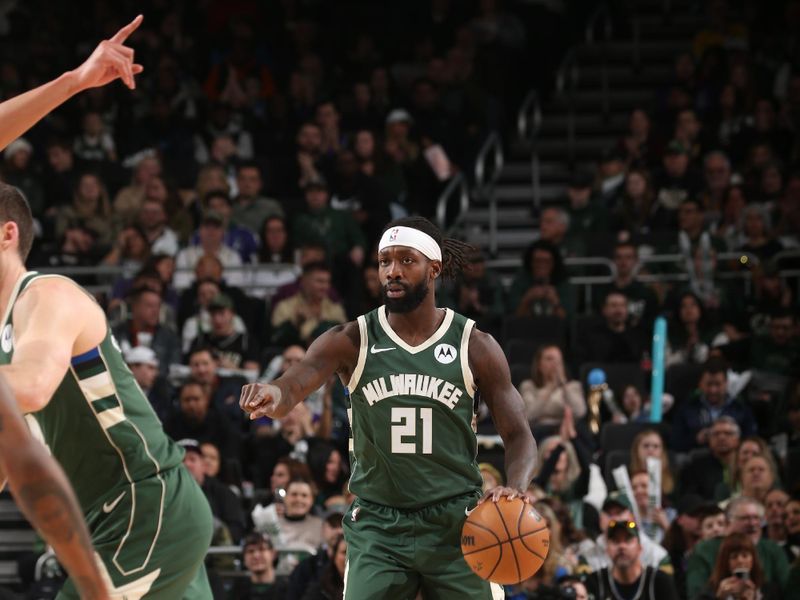 MILWAUKEE, WI - FEBRUARY 9: Patrick Beverley #21 of the Milwaukee Bucks handles the ball during the game against the Charlotte Hornets on February 9, 2024 at the Fiserv Forum Center in Milwaukee, Wisconsin. NOTE TO USER: User expressly acknowledges and agrees that, by downloading and or using this Photograph, user is consenting to the terms and conditions of the Getty Images License Agreement. Mandatory Copyright Notice: Copyright 2024 NBAE (Photo by Gary Dineen/NBAE via Getty Images).