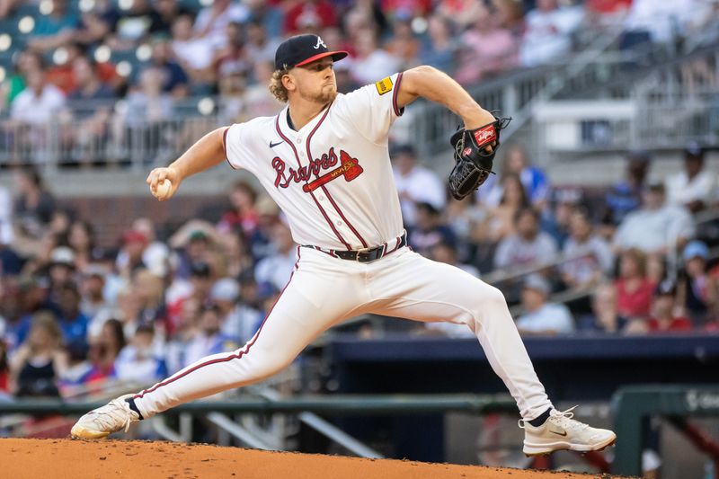 Aug 22, 2024; Cumberland, Georgia, USA; Atlanta Braves pitcher Spencer Schwellenbach (56) pitches the ball against Atlanta Braves during the third inning at Truist Park. Mandatory Credit: Jordan Godfree-USA TODAY Sports