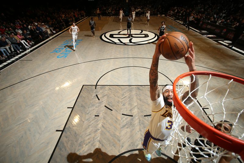 BROOKLYN, NY - MARCH 31: Anthony Davis #3 of the Los Angeles Lakers goes to the basket during the game on March 31, 2024 at Barclays Center in Brooklyn, New York. NOTE TO USER: User expressly acknowledges and agrees that, by downloading and or using this Photograph, user is consenting to the terms and conditions of the Getty Images License Agreement. Mandatory Copyright Notice: Copyright 2024 NBAE (Photo by Nathaniel S. Butler/NBAE via Getty Images)