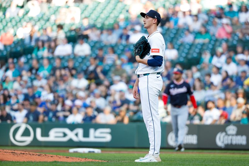 May 28, 2025; Seattle, Washington, USA; Seattle Mariners starting pitcher George Kirby (68) reacts after surrendering a solo-home run to Washington Nationals designated hitter Josh Bell (19, not pictured) during the second inning at T-Mobile Park. Mandatory Credit: Joe Nicholson-Imagn Images