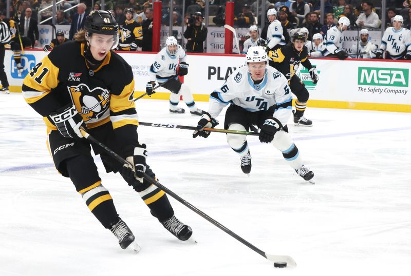 Dec 14, 2025; Pittsburgh, Pennsylvania, USA;  Pittsburgh Penguins right wing Ville Koivunen (41) moves the puck against the Utah Mammoth during the second period at PPG Paints Arena. Mandatory Credit: Charles LeClaire-Imagn Images