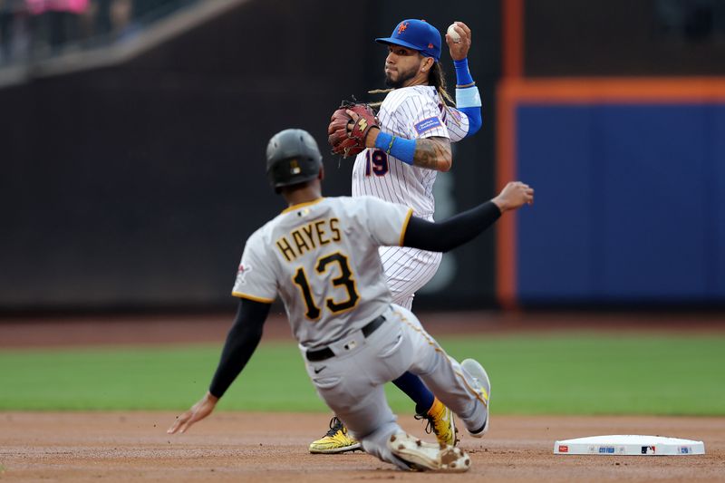 Aug 15, 2023; New York City, New York, USA; New York Mets second baseman Jonathan Arauz (19) forces out Pittsburgh Pirates third baseman Ke'Bryan Hayes (13) and throws to first to complete a double play on a ball hit by Pirates left fielder Bryan Reynolds (not pictured) during the first inning at Citi Field. Mandatory Credit: Brad Penner-USA TODAY Sports