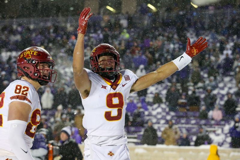 Nov 25, 2023; Manhattan, Kansas, USA; Iowa State Cyclones wide receiver Jayden Higgins (9) and tight end Tyler Moore (82) celebrate a touchdown in the fourth quarter against the Kansas State Wildcats at Bill Snyder Family Football Stadium. Mandatory Credit: Scott Sewell-USA TODAY Sports