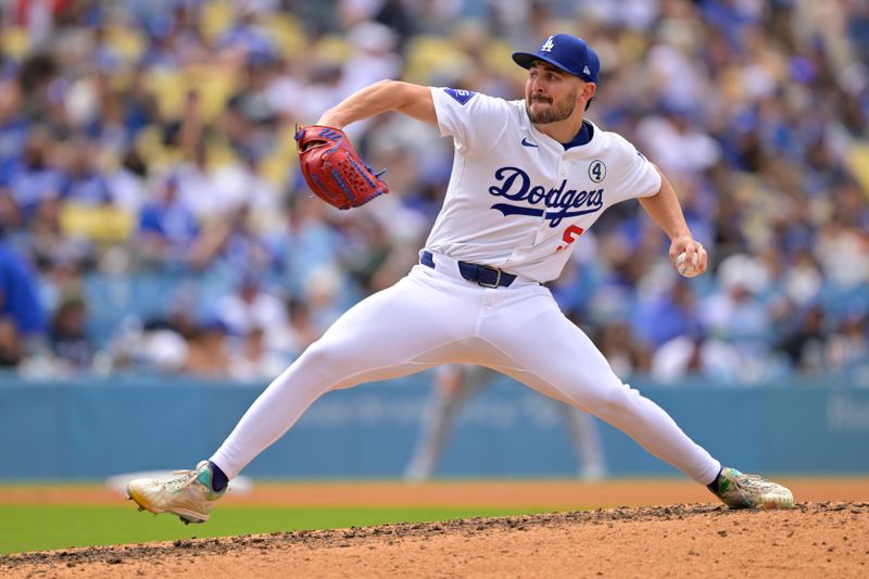 Jun 2, 2024; Los Angeles, California, USA;  Los Angeles Dodgers pitcher Alex Vesia (51) delivers to the plate in the eighth inning against the Colorado Rockies at Dodger Stadium. Credit: Jayne Kamin-Oncea-USA TODAY Sports