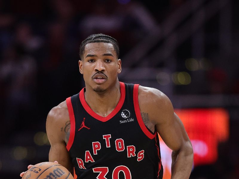 HOUSTON, TEXAS - FEBRUARY 09: Ochai Agbaji #30 of the Toronto Raptors drives down court against the Houston Rockets during the second half at Toyota Center on February 09, 2025 in Houston, Texas. NOTE TO USER: User expressly acknowledges and agrees that, by downloading and or using this photograph, User is consenting to the terms and conditions of the Getty Images License Agreement. (Photo by Alex Slitz/Getty Images)