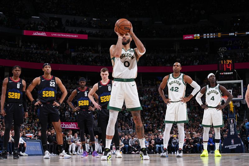 DENVER, CO - MARCH 7: Jayson Tatum #0 of the Boston Celtics shoots a free throw during the game against the Denver Nuggets on March 7, 2024 at the Ball Arena in Denver, Colorado. NOTE TO USER: User expressly acknowledges and agrees that, by downloading and/or using this Photograph, user is consenting to the terms and conditions of the Getty Images License Agreement. Mandatory Copyright Notice: Copyright 2024 NBAE (Photo by Garrett Ellwood/NBAE via Getty Images)