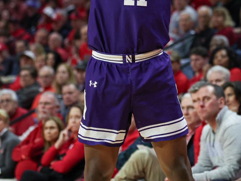 Feb 15, 2024; Piscataway, New Jersey, USA; Northwestern Wildcats guard Jordan Clayton (11) shoots during the first half against the Rutgers Scarlet Knights at Jersey Mike's Arena. Mandatory Credit: Vincent Carchietta-USA TODAY Sports