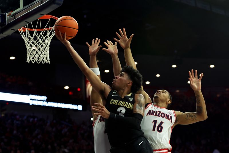 Jan 4, 2024; Tucson, Arizona, USA; Colorado Buffaloes guard Julian Hammond III (3) shoots a basket against Arizona Wildcats forward Keshad Johnson (16) during the first half at McKale Center. Mandatory Credit: Zachary BonDurant-USA TODAY Sports