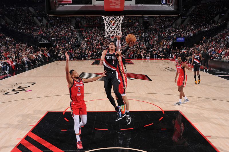 PORTLAND, OR - FEBRUARY 10: Dalano Banton #5 of the Portland Trail Blazers drives to the basket during the game against the New Orleans Pelicans on February 10, 2024 at the Moda Center Arena in Portland, Oregon. NOTE TO USER: User expressly acknowledges and agrees that, by downloading and or using this photograph, user is consenting to the terms and conditions of the Getty Images License Agreement. Mandatory Copyright Notice: Copyright 2024 NBAE (Photo by Cameron Browne/NBAE via Getty Images)