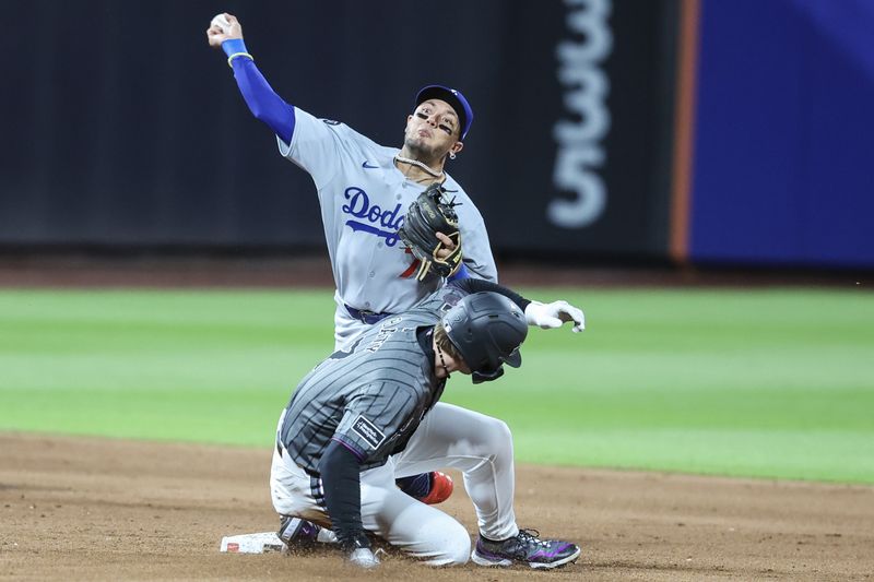 May 24, 2025; New York City, New York, USA;  Los Angeles Dodgers second baseman Miguel Rojas (72) throws past New York Mets third baseman Brett Baty (7) attempting to complete a double in the sixth inning at Citi Field. Mandatory Credit: Wendell Cruz-Imagn Images