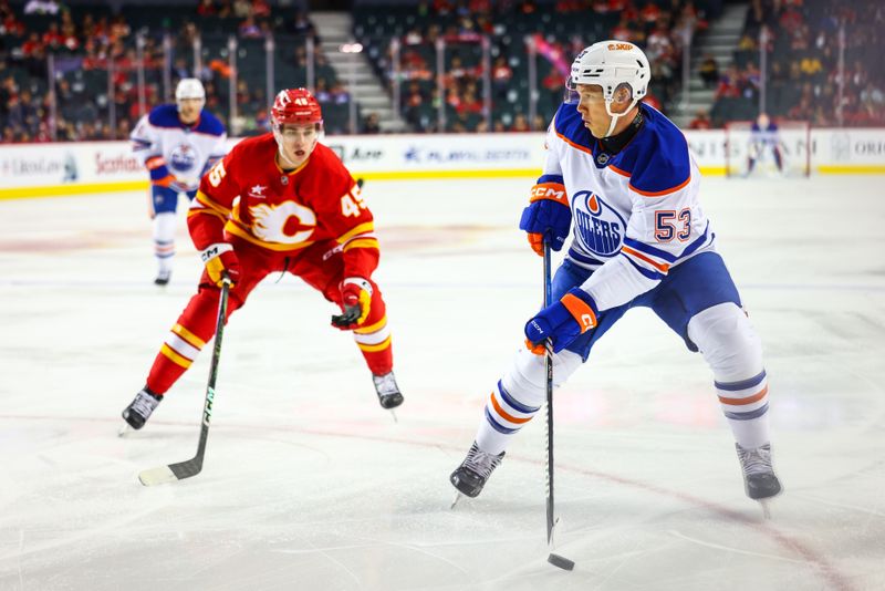 Sep 23, 2024; Calgary, Alberta, CAN; Edmonton Oilers center Jeff Skinner (53) controls the puck against the Calgary Flames during the first period at Scotiabank Saddledome. Mandatory Credit: Sergei Belski-Imagn Images