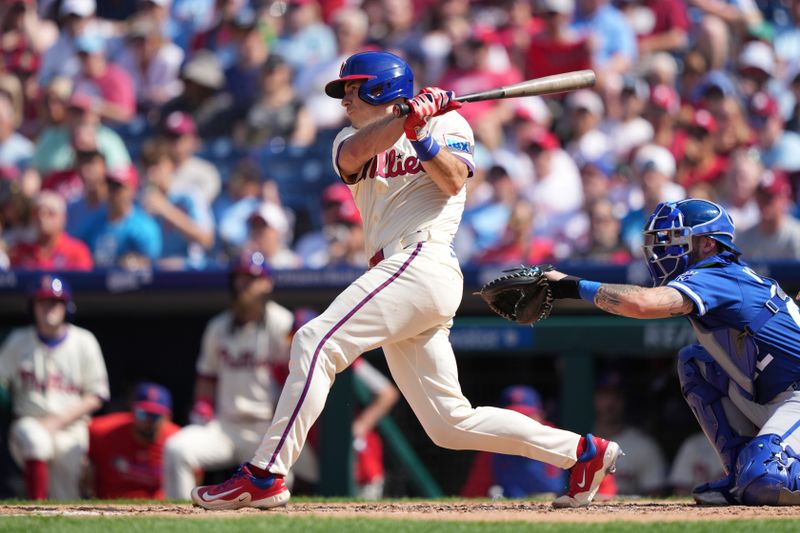 Sep 14, 2025; Philadelphia, Pennsylvania, USA; Philadelphia Phillies catcher J.T. Realmuto (10) hits a single against the Kansas City Royals in the fourth inning at Citizens Bank Park. Mandatory Credit: Kyle Ross-Imagn Images