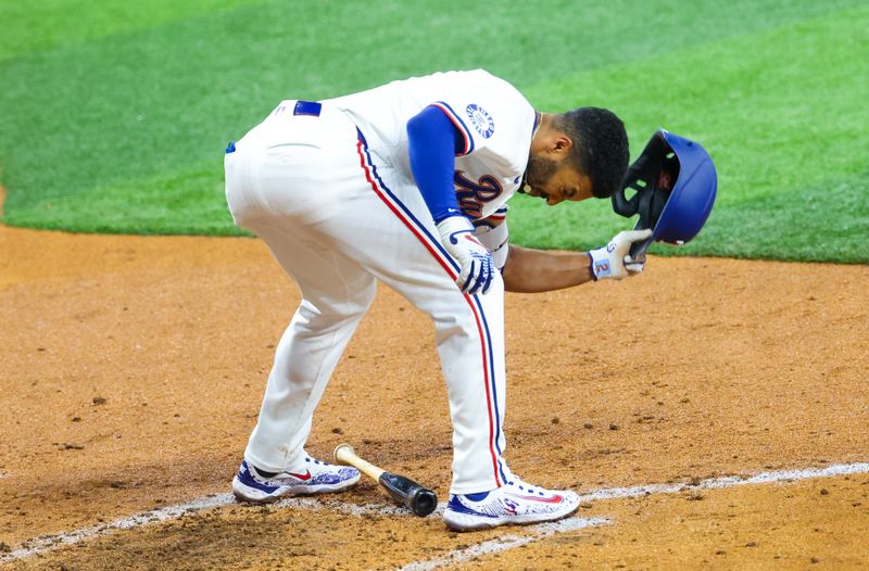 May 14, 2024; Arlington, Texas, USA;  Texas Rangers second base Marcus Semien (2) reacts after striking out during the fourth inning against the Cleveland Guardians at Globe Life Field. Mandatory Credit: Kevin Jairaj-USA TODAY Sports