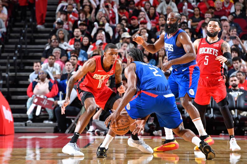 HOUSTON, TX - MARCH 6: Jabari Smith Jr. #10 of the Houston Rockets plays defense during the game against the LA Clippers on March 6, 2024 at the Toyota Center in Houston, Texas. NOTE TO USER: User expressly acknowledges and agrees that, by downloading and or using this photograph, User is consenting to the terms and conditions of the Getty Images License Agreement. Mandatory Copyright Notice: Copyright 2024 NBAE (Photo by Logan Riely/NBAE via Getty Images)