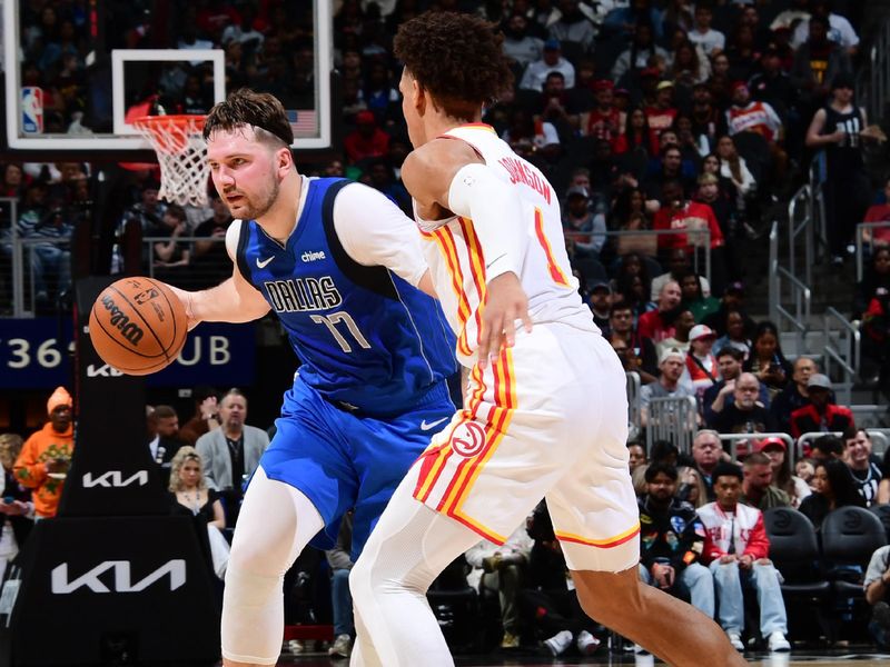 ATLANTA, GA - JANUARY 26: Luka Doncic #77 of the Dallas Mavericks dribbles the ball during the game against the Atlanta Hawks on January 26, 2024 at State Farm Arena in Atlanta, Georgia.  NOTE TO USER: User expressly acknowledges and agrees that, by downloading and/or using this Photograph, user is consenting to the terms and conditions of the Getty Images License Agreement. Mandatory Copyright Notice: Copyright 2024 NBAE (Photo by Scott Cunningham/NBAE via Getty Images)