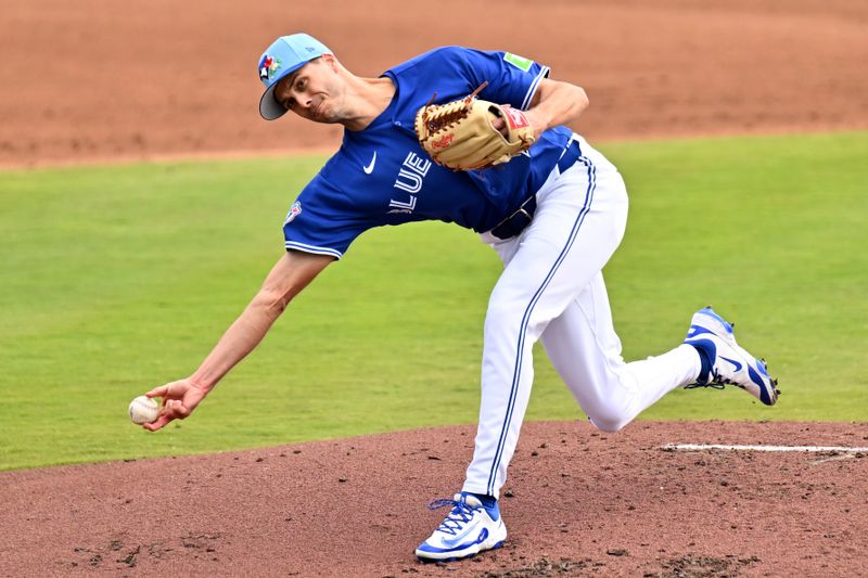 Feb 26, 2026; Dunedin, Florida, USA; Toronto Blue Jays relief pitcher Tyler Rogers (71) throws a pitch in the second inning against the Florida Marlins during spring training at TD Ballpark. Mandatory Credit: Jonathan Dyer-Imagn Images