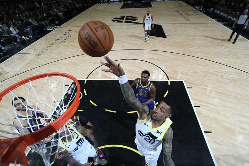 SALT LAKE CITY, UT - FEBRUARY 15: John Collins #20 of the Utah Jazz shoots the ball during the game against the Golden State Warriors on February 15, 2024 at Delta Center in Salt Lake City, Utah. NOTE TO USER: User expressly acknowledges and agrees that, by downloading and or using this Photograph, User is consenting to the terms and conditions of the Getty Images License Agreement. Mandatory Copyright Notice: Copyright 2024 NBAE (Photo by Melissa Majchrzak/NBAE via Getty Images)