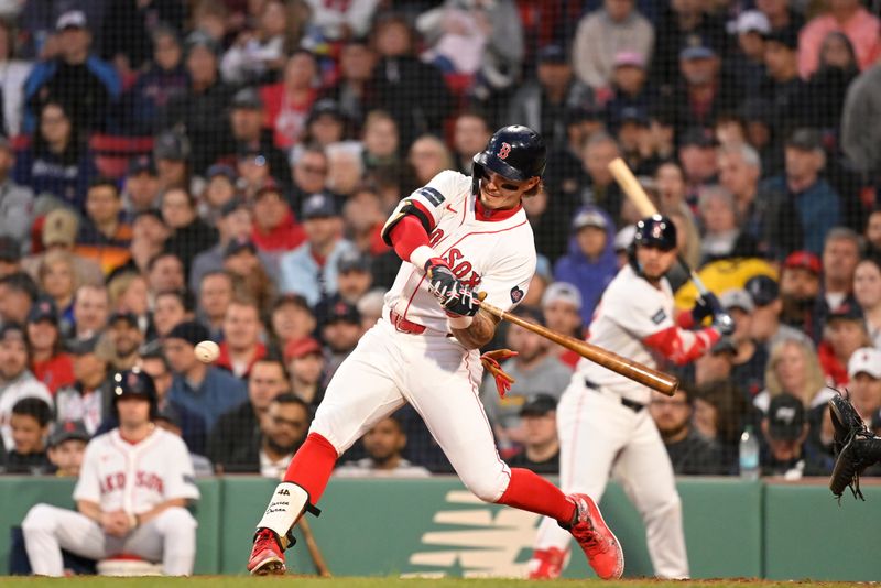 May 16, 2024; Boston, Massachusetts, USA;  Boston Red Sox center fielder Jarren Duran (16) hits a double against the Tampa Bay Rays  during the third inning at Fenway Park. Mandatory Credit: Eric Canha-USA TODAY Sports