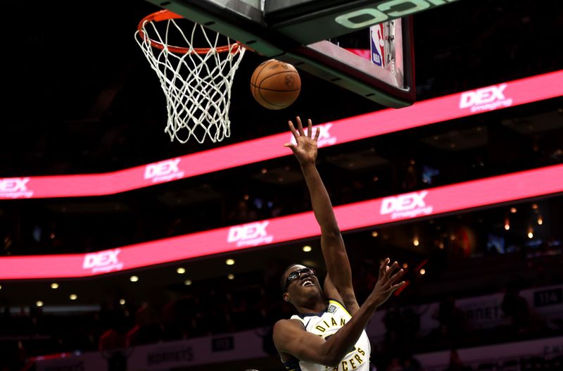 CHARLOTTE, NORTH CAROLINA - FEBRUARY 04: Jalen Smith #25 of the Indiana Pacers lays the ball up during the first half against the Charlotte Hornets at Spectrum Center on February 04, 2024 in Charlotte, North Carolina. NOTE TO USER: User expressly acknowledges and agrees that, by downloading and or using this photograph, User is consenting to the terms and conditions of the Getty Images License Agreement. (Photo by David Jensen/Getty Images)