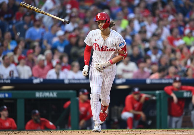 Aug 17, 2024; Philadelphia, Pennsylvania, USA; Philadelphia Phillies infielder Alec Bohm (28) tosses his bat after hitting a fly ball against the Washington Nationals in the second inning at Citizens Bank Park. Mandatory Credit: Kyle Ross-USA TODAY Sports