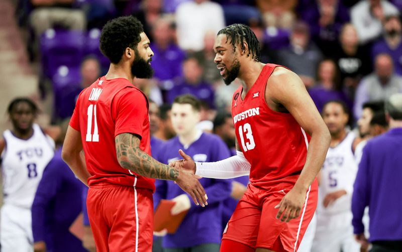 Jan 13, 2024; Fort Worth, Texas, USA; Houston Cougars guard Damian Dunn (11) and Houston Cougars forward J'Wan Roberts (13) react during the first half against the Houston Cougars at Ed and Rae Schollmaier Arena. Mandatory Credit: Kevin Jairaj-USA TODAY Sports