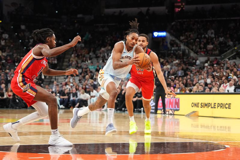 SAN ANTONIO, TX - DECEMBER 8: Devin Vassell #24 of the San Antonio Spurs drives to the basket during the game against the New Orleans Pelicans on December 8, 2024 at the Frost Bank Center in San Antonio, Texas. NOTE TO USER: User expressly acknowledges and agrees that, by downloading and or using this photograph, user is consenting to the terms and conditions of the Getty Images License Agreement. Mandatory Copyright Notice: Copyright 2024 NBAE (Photos by Jesse D. Garrabrant/NBAE via Getty Images)