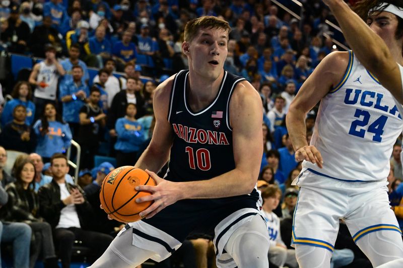 Mar 4, 2023; Los Angeles, California, USA;  Arizona Wildcats forward Azuolas Tubelis (10) drives to the basket against UCLA Bruins guard Jaime Jaquez Jr. (24) during the first half at Pauley Pavilion presented by Wescom. Mandatory Credit: Richard Mackson-USA TODAY Sports