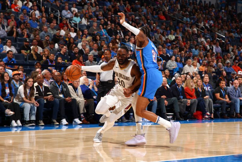 OKLAHOMA CITY, OK - NOVEMBER 13:  Jaylen Nowell #20 of the New Orleans Pelicans drives to the basket during the game against the Oklahoma City Thunder on November 13, 2024 at Paycom Center in Oklahoma City, Oklahoma. NOTE TO USER: User expressly acknowledges and agrees that, by downloading and or using this photograph, User is consenting to the terms and conditions of the Getty Images License Agreement. Mandatory Copyright Notice: Copyright 2024 NBAE (Photo by Zach Beeker/NBAE via Getty Images)
