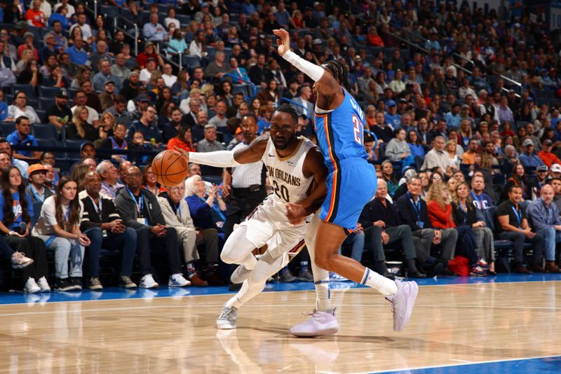 OKLAHOMA CITY, OK - NOVEMBER 13:  Jaylen Nowell #20 of the New Orleans Pelicans drives to the basket during the game against the Oklahoma City Thunder on November 13, 2024 at Paycom Center in Oklahoma City, Oklahoma. NOTE TO USER: User expressly acknowledges and agrees that, by downloading and or using this photograph, User is consenting to the terms and conditions of the Getty Images License Agreement. Mandatory Copyright Notice: Copyright 2024 NBAE (Photo by Zach Beeker/NBAE via Getty Images)