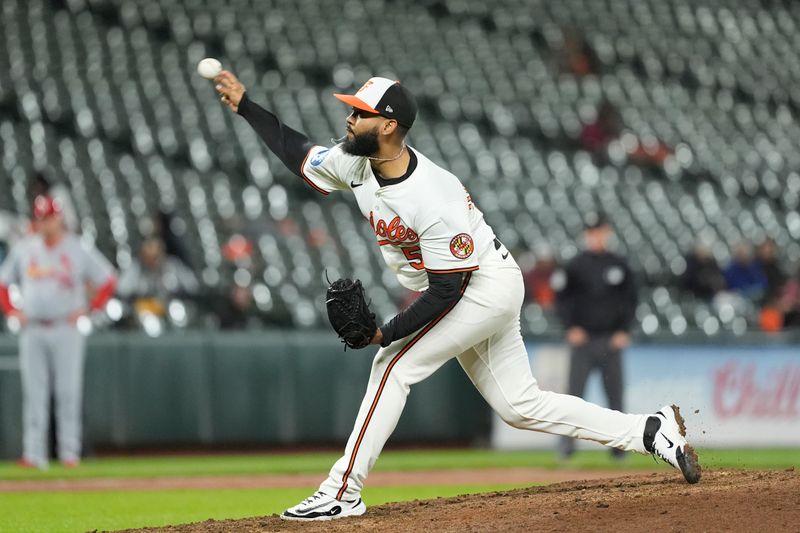 May 28, 2025; Baltimore, Maryland, USA; Baltimore Orioles pitcher Seranthony Dominguez (56) delivers a pitch against the St. Louis Cardinals during the ninth inning at Oriole Park at Camden Yards. Mandatory Credit: Gregory Fisher-Imagn Images