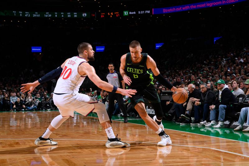 BOSTON, MA - NOVEMBER 25: Kristaps Porzingis #8 of the Boston Celtics handles the ball during the game against the LA Clippers on November 25, 2024 at TD Garden in Boston, Massachusetts. NOTE TO USER: User expressly acknowledges and agrees that, by downloading and/or using this Photograph, user is consenting to the terms and conditions of the Getty Images License Agreement. Mandatory Copyright Notice: Copyright 2024 NBAE (Photo by Brian Babineau/NBAE via Getty Images)