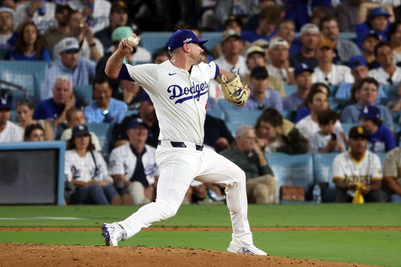 Oct 6, 2024; Los Angeles, California, USA; Los Angeles Dodgers pitcher Daniel Hudson (41) pitches in the seventh inning against the San Diego Padres during game two of the NLDS for the 2024 MLB Playoffs at Dodger Stadium. Mandatory Credit: Kiyoshi Mio-Imagn Images