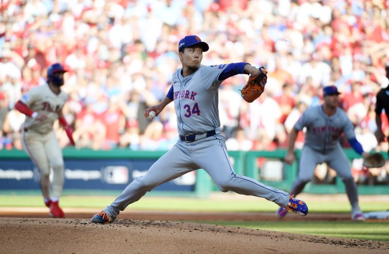 Oct 5, 2024; Philadelphia, PA, USA;  New York Mets pitcher Kodai Senga (34) throws a pitch against the Philadelphia Phillies in the first inning in game one of the NLDS for the 2024 MLB Playoffs at Citizens Bank Park. Mandatory Credit: Eric Hartline-Imagn Images