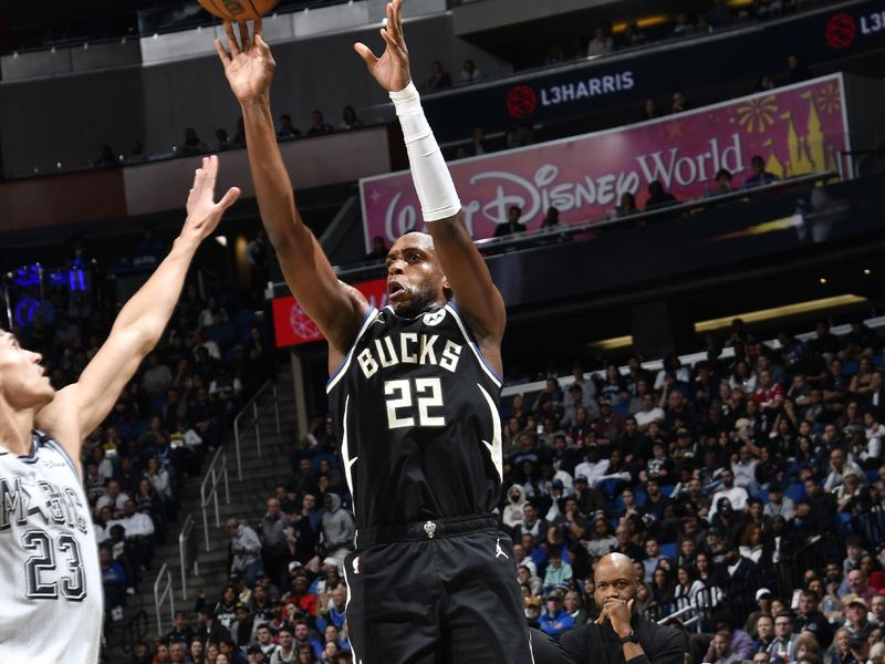 ORLANDO, FL - JANUARY 10: Khris Middleton #22 of the Milwaukee Bucks shoots the ball during the game against the Orlando Magic on January 10, 2025 at Kia Center in Orlando, Florida. NOTE TO USER: User expressly acknowledges and agrees that, by downloading and or using this photograph, User is consenting to the terms and conditions of the Getty Images License Agreement. Mandatory Copyright Notice: Copyright 2025 NBAE (Photo by Fernando Medina/NBAE via Getty Images)