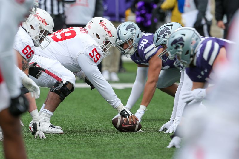 Oct 28, 2023; Manhattan, Kansas, USA; The Houston Cougars face off against the Kansas State Wildcats during the fourth quarter at Bill Snyder Family Football Stadium. Mandatory Credit: Scott Sewell-USA TODAY Sports