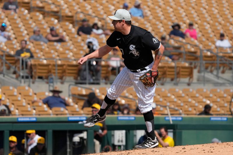 Feb 28, 2024; Phoenix, Arizona, USA; Chicago White Sox pitcher Bryan Shaw (27) throws against the San Diego Padres in the fourth inning at Camelback Ranch-Glendale. Mandatory Credit: Rick Scuteri-USA TODAY Sports