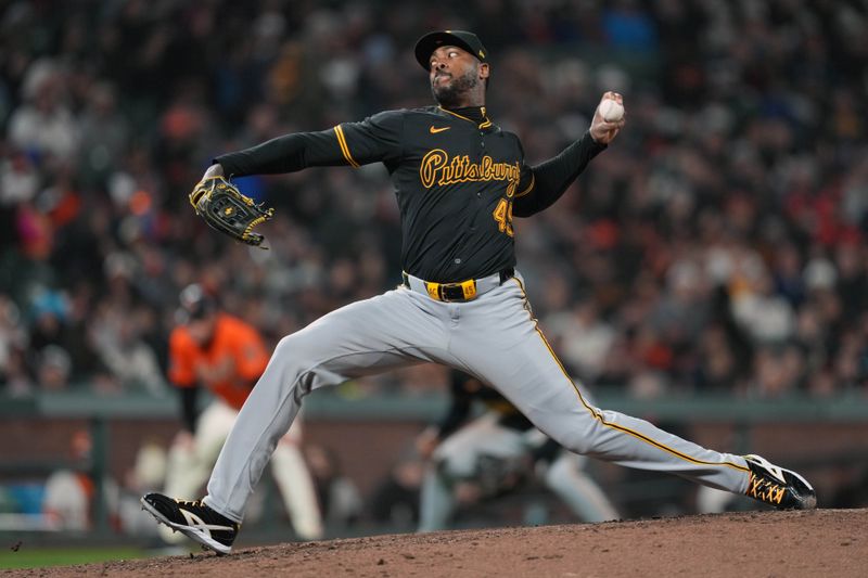 Apr 26, 2024; San Francisco, California, USA; Pittsburgh Pirates pitcher Aroldis Chapman (45) throws a pitch against the San Francisco Giants during the eighth inning at Oracle Park. Mandatory Credit: Darren Yamashita-USA TODAY Sports