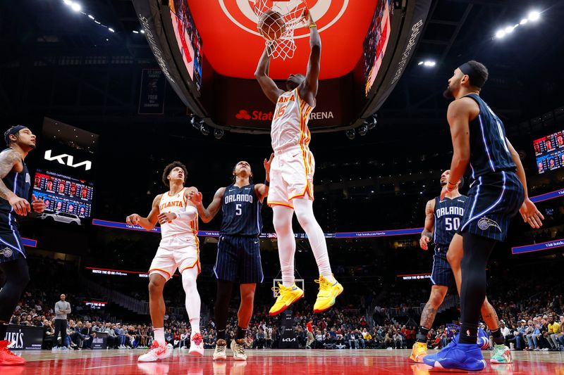 ATLANTA, GEORGIA - JANUARY 17: Clint Capela #15 of the Atlanta Hawks dunks during the first half against the Orlando Magic at State Farm Arena on January 17, 2024 in Atlanta, Georgia. NOTE TO USER: User expressly acknowledges and agrees that, by downloading and or using this photograph, User is consenting to the terms and conditions of the Getty Images License Agreement. (Photo by Todd Kirkland/Getty Images)