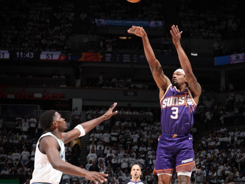 MINNEAPOLIS, MN -  APRIL 20: Bradley Beal #3 of the Phoenix Suns shoots a three point basket against the Minnesota Timberwolves during Round 1 Game 1 of the 2024 NBA Playoffs on April 20, 2024 at Target Center in Minneapolis, Minnesota. NOTE TO USER: User expressly acknowledges and agrees that, by downloading and or using this Photograph, user is consenting to the terms and conditions of the Getty Images License Agreement. Mandatory Copyright Notice: Copyright 2024 NBAE (Photo by David Sherman/NBAE via Getty Images)