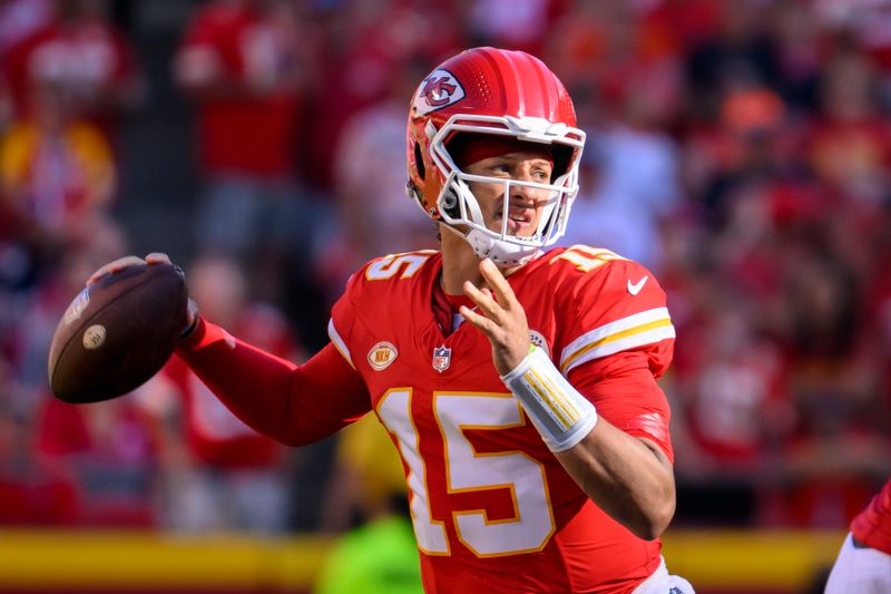 Kansas City Chiefs quarterback Patrick Mahomes looks to pass against the Chicago Bears during the first half of an NFL football game, Sunday, Sept. 24, 2023 in Kansas City, Mo. (AP Photo/Reed Hoffmann)