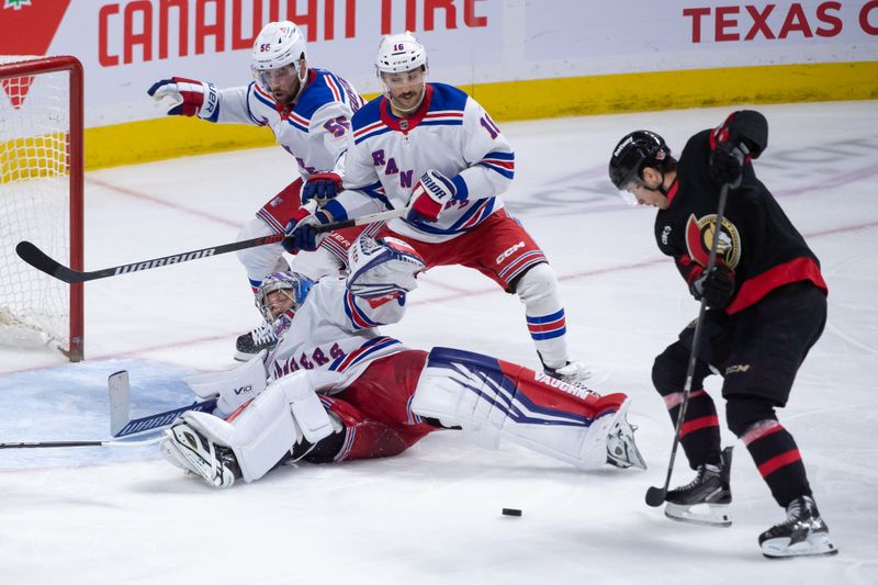 Jan 27, 2024; Ottawa, Ontario, CAN; Ottawa Senators center Shane Pinto (57) is unable to capitalize on a loose puck in front of New York Rangers goalie Jonathan Quick (32) in the third period at the Canadian Tire Centre. Mandatory Credit: Marc DesRosiers-USA TODAY Sports