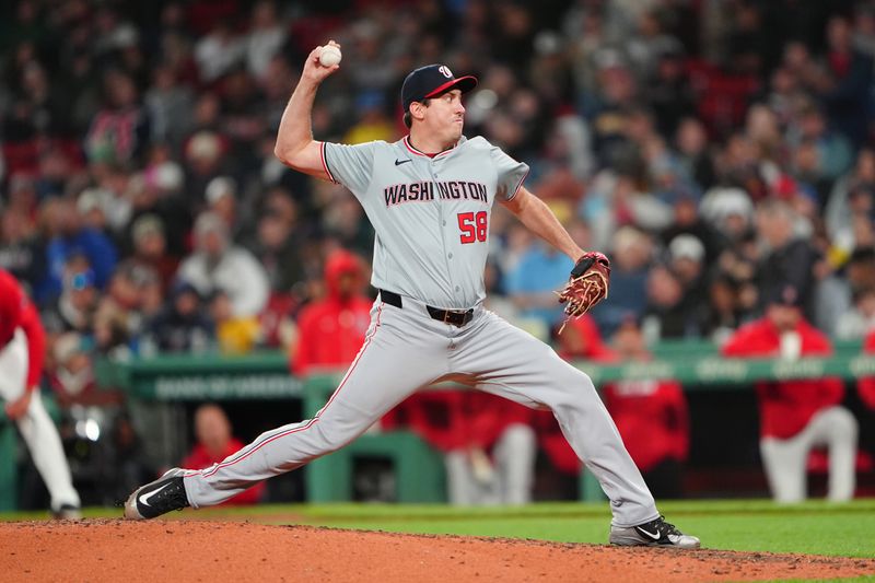 May 10, 2024; Boston, Massachusetts, USA;  Washington Nationals pitcher Derek Law (58) delivers a pitch against the Boston Red Sox during the sixth inning at Fenway Park. Mandatory Credit: Gregory Fisher-USA TODAY Sports