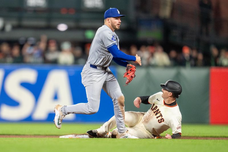 May 13, 2024; San Francisco, California, USA; Los Angeles Dodgers second baseman Gavin Lux (9) completes the double play to end the game against the San Francisco Giants during the tenth inning at Oracle Park. Mandatory Credit: Neville E. Guard-USA TODAY Sports