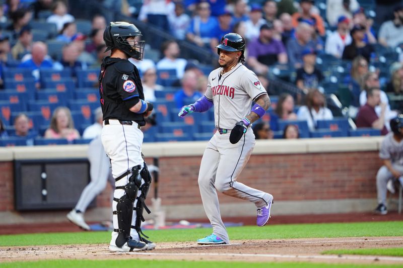 May 31, 2024; New York City, New York, USA; Arizona Diamondbacks second baseman Ketel Marte (4) scores a run on Arizona Diamondbacks left fielder Lourdes Gurriel Jr. (not pictured) RBI single against the New York Mets during the first inning at Citi Field. Mandatory Credit: Gregory Fisher-USA TODAY Sports